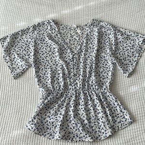 Sienna Sky Women’s Peplum Floral Top